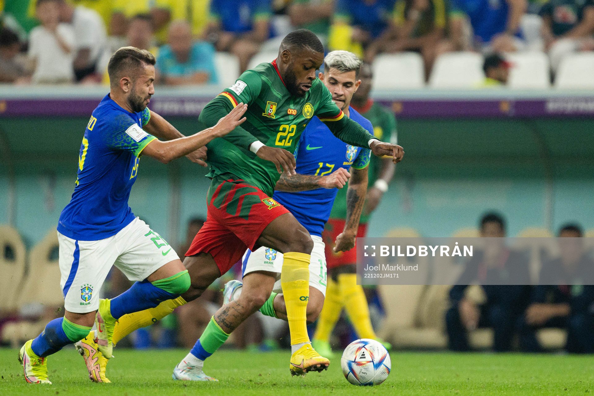 Olivier Ntcham of Cameroon against Danilo and Bruno Guimaraes of Brazil during the FIFA World Cup 2022 football match between Cameroon and Brazil on December 2, 2022 in Doha.