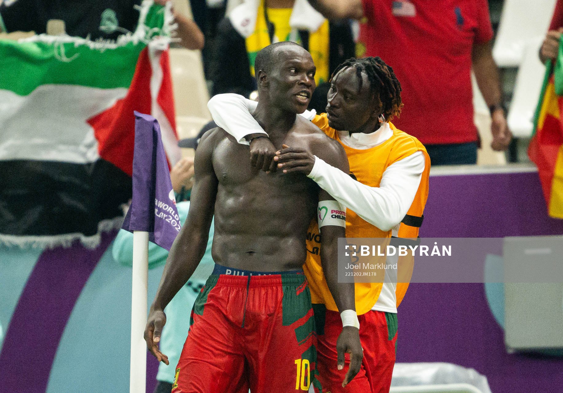 Vincent Aboubakar and Olivier Mbaizo of Cameroon celebrate