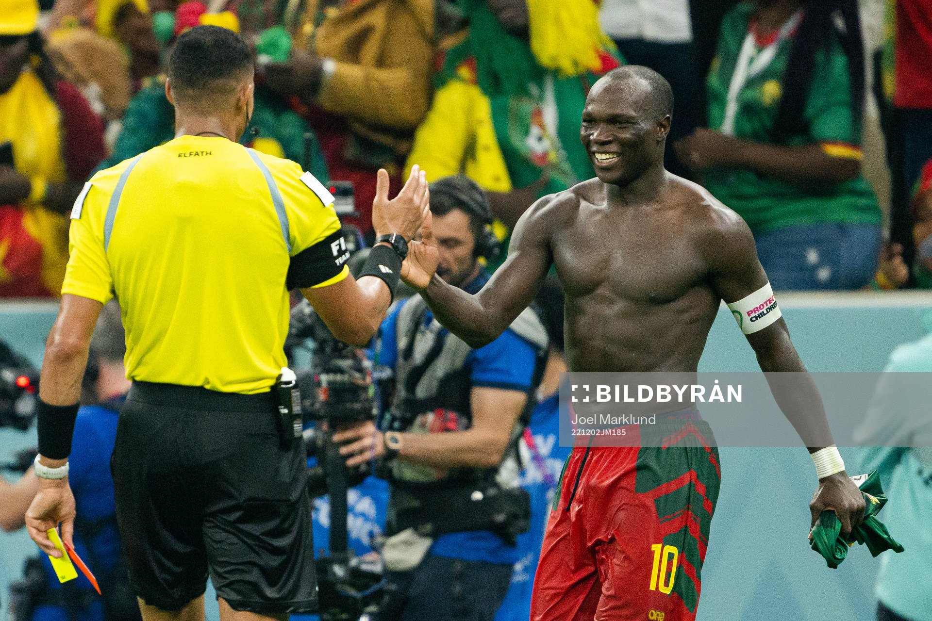 Vincent Aboubakar of Cameroon receives his second yellow