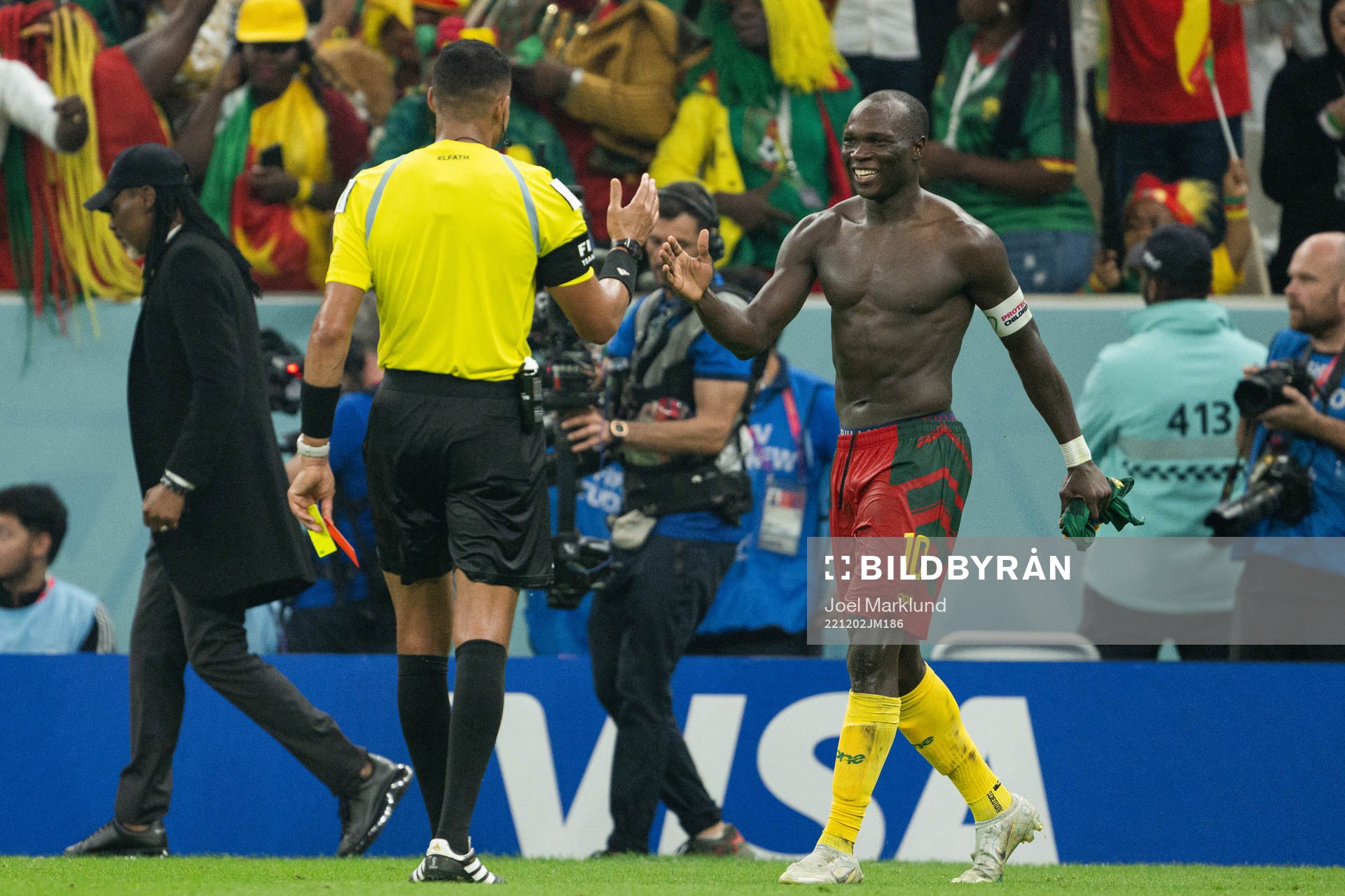 Vincent Aboubakar of Cameroon receives his second yellow