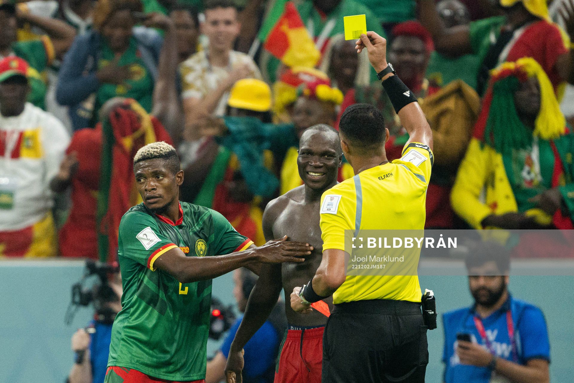 Vincent Aboubakar of Cameroon receives his second yellow
