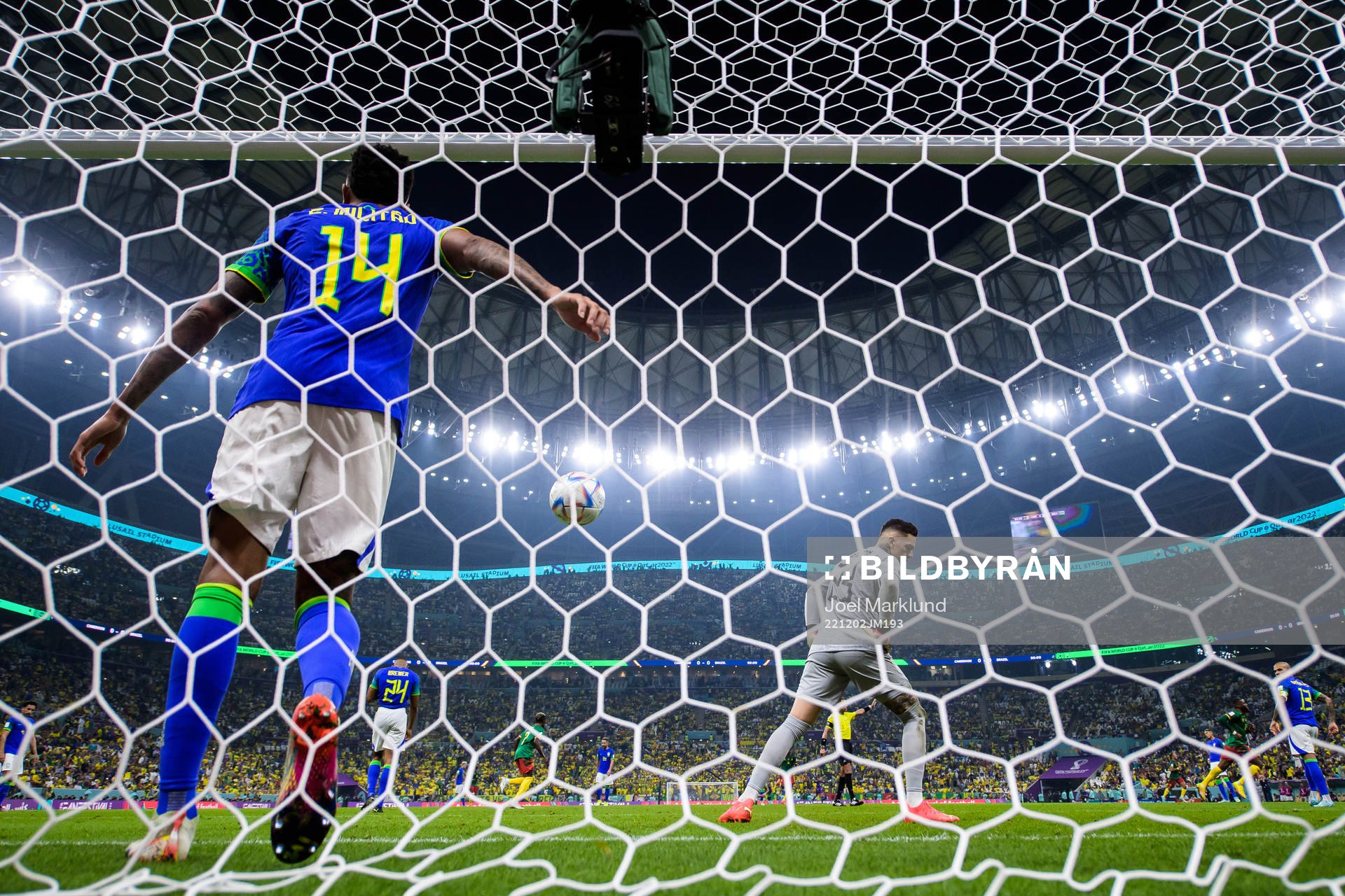 Eder Militao and goalkeeper Ederson of Brazil look  dejected