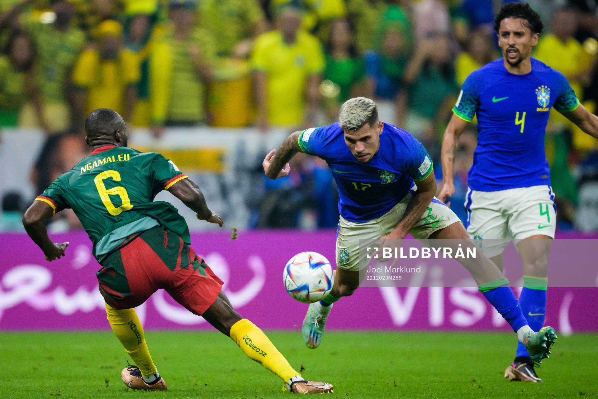 Nicolas Moumi Ngamaleu of Cameroon and Bruno Guimaraes of