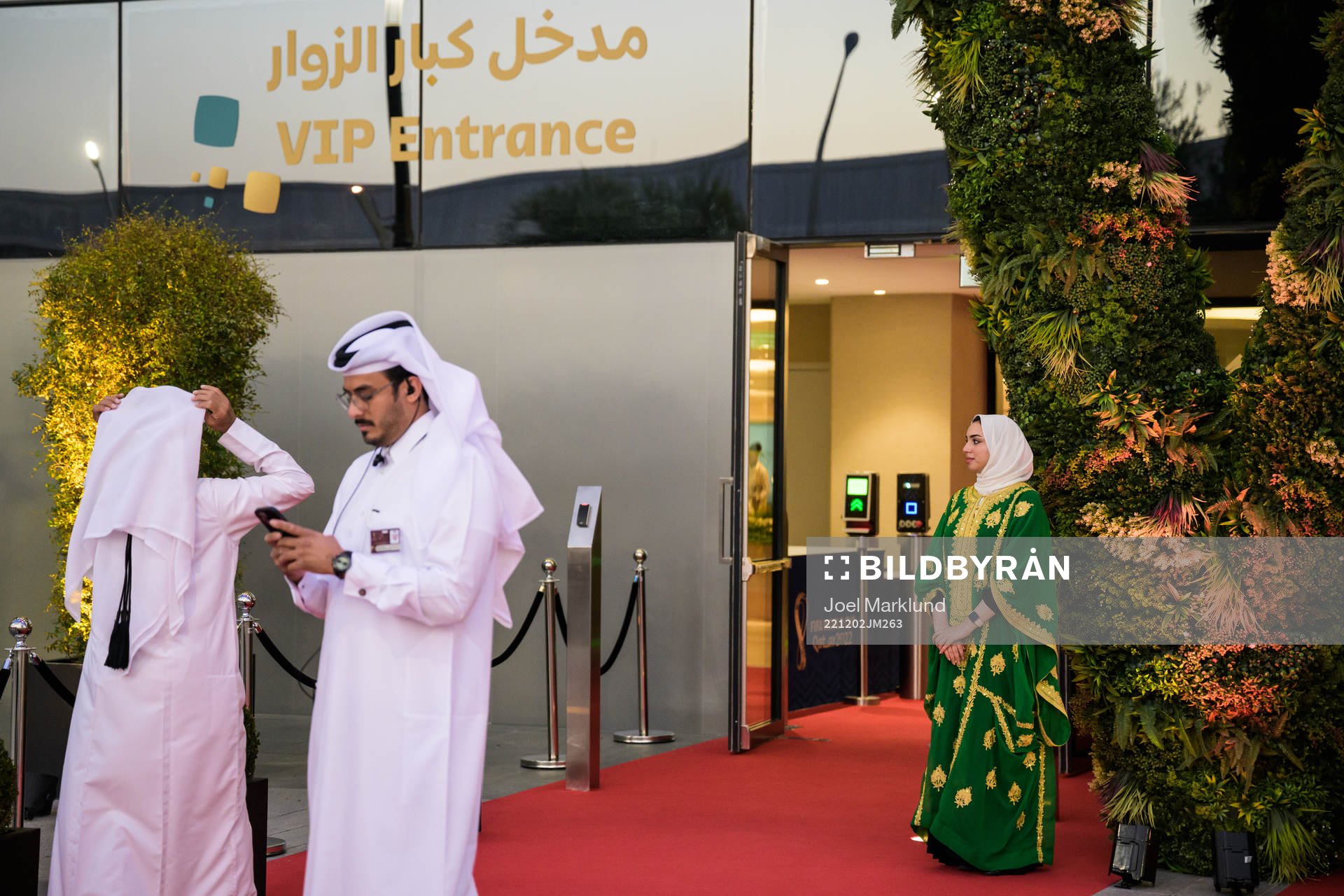 Hosts are standing by a VIP entrance