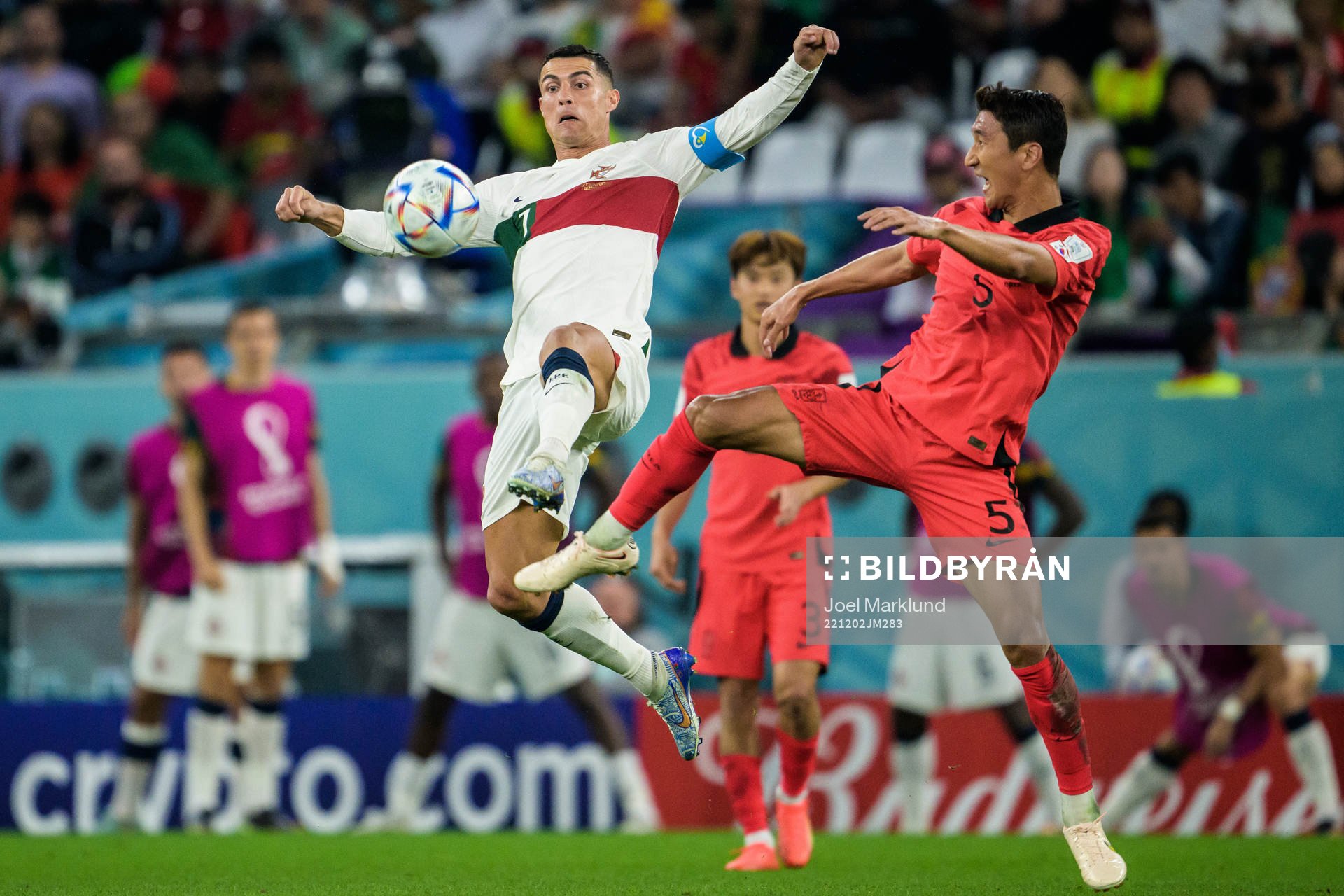 Cristiano Ronaldo of Portugal and Wooyoung Jung of South