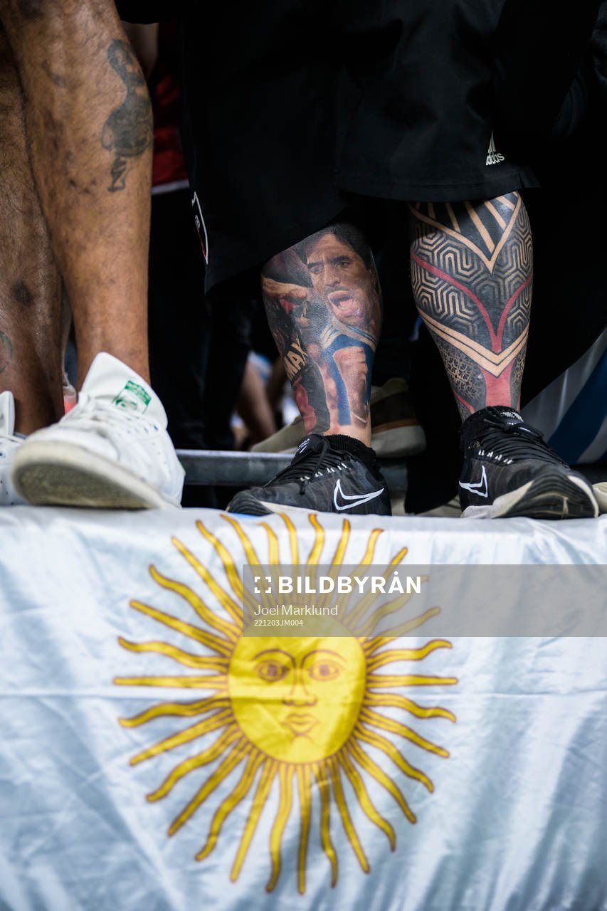 A tattoo of Diego Maradona on the leg of an Argentinian fan ahead of the FIFA World Cup 2022 round of 16 football match between Argentina and Australia on December 3, 2022 in Doha. 