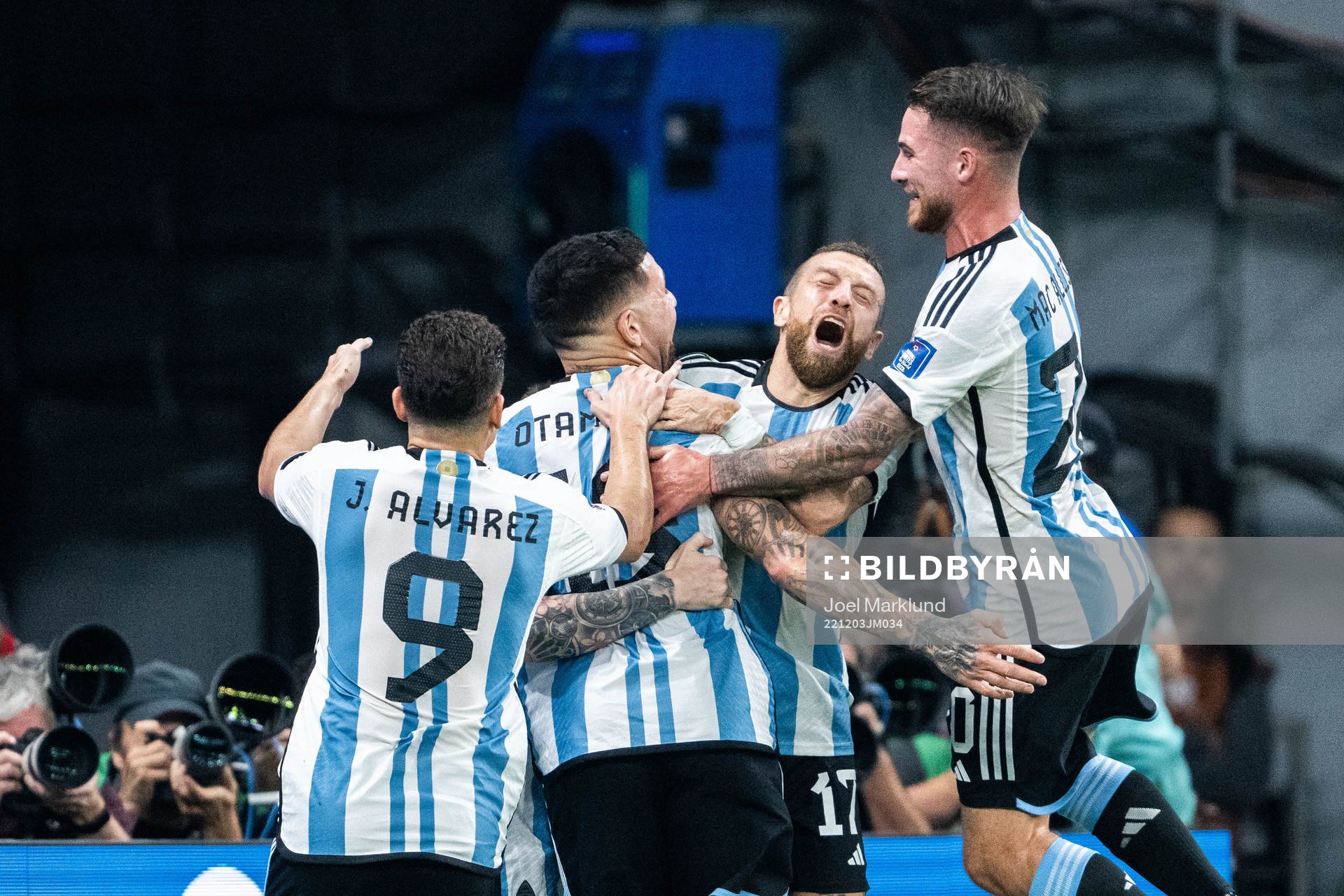 Lionel Messi of Argentina celebrates with Julian Alvarez,