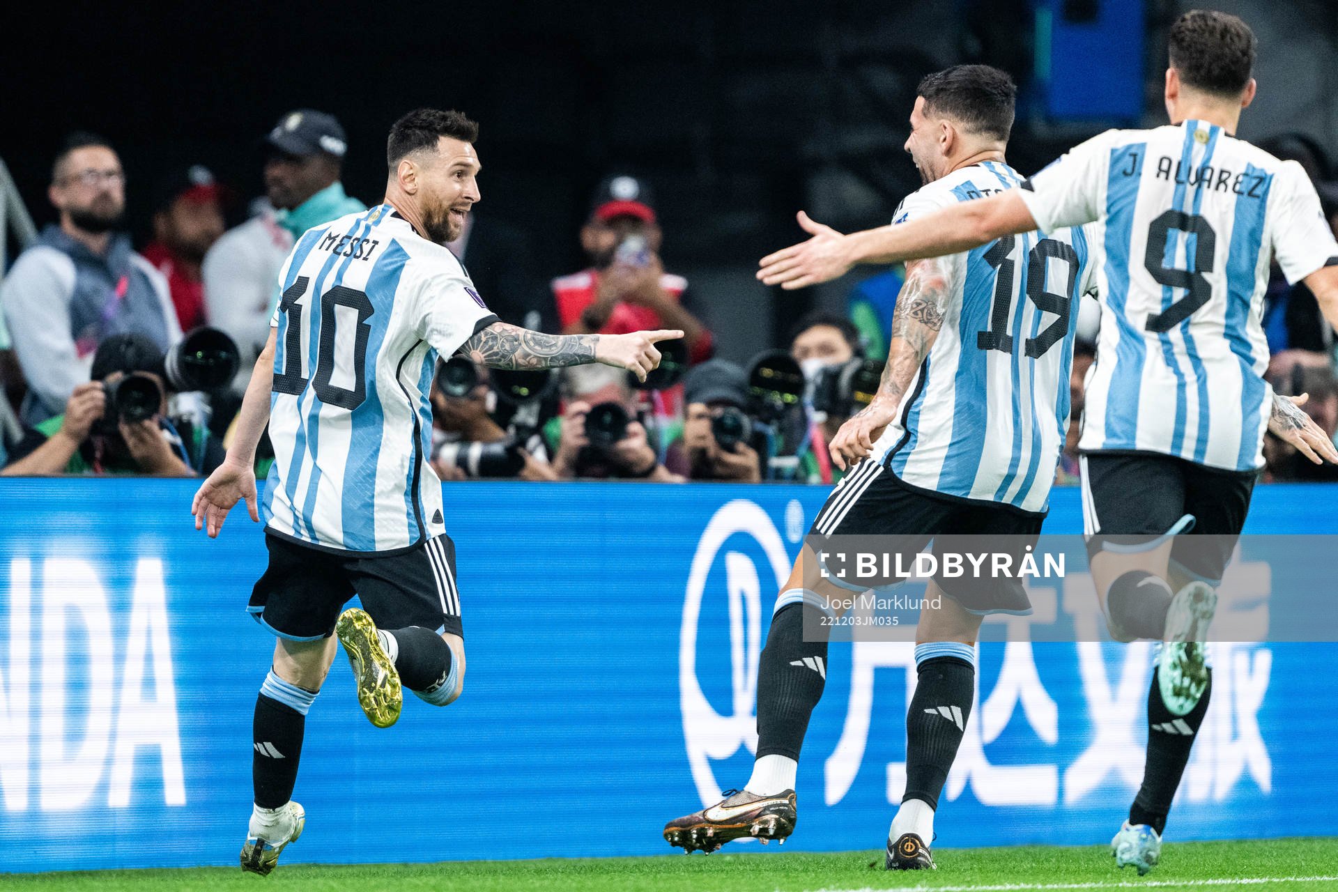 Lionel Messi of Argentina celebrates with Nicolas Otamendi
