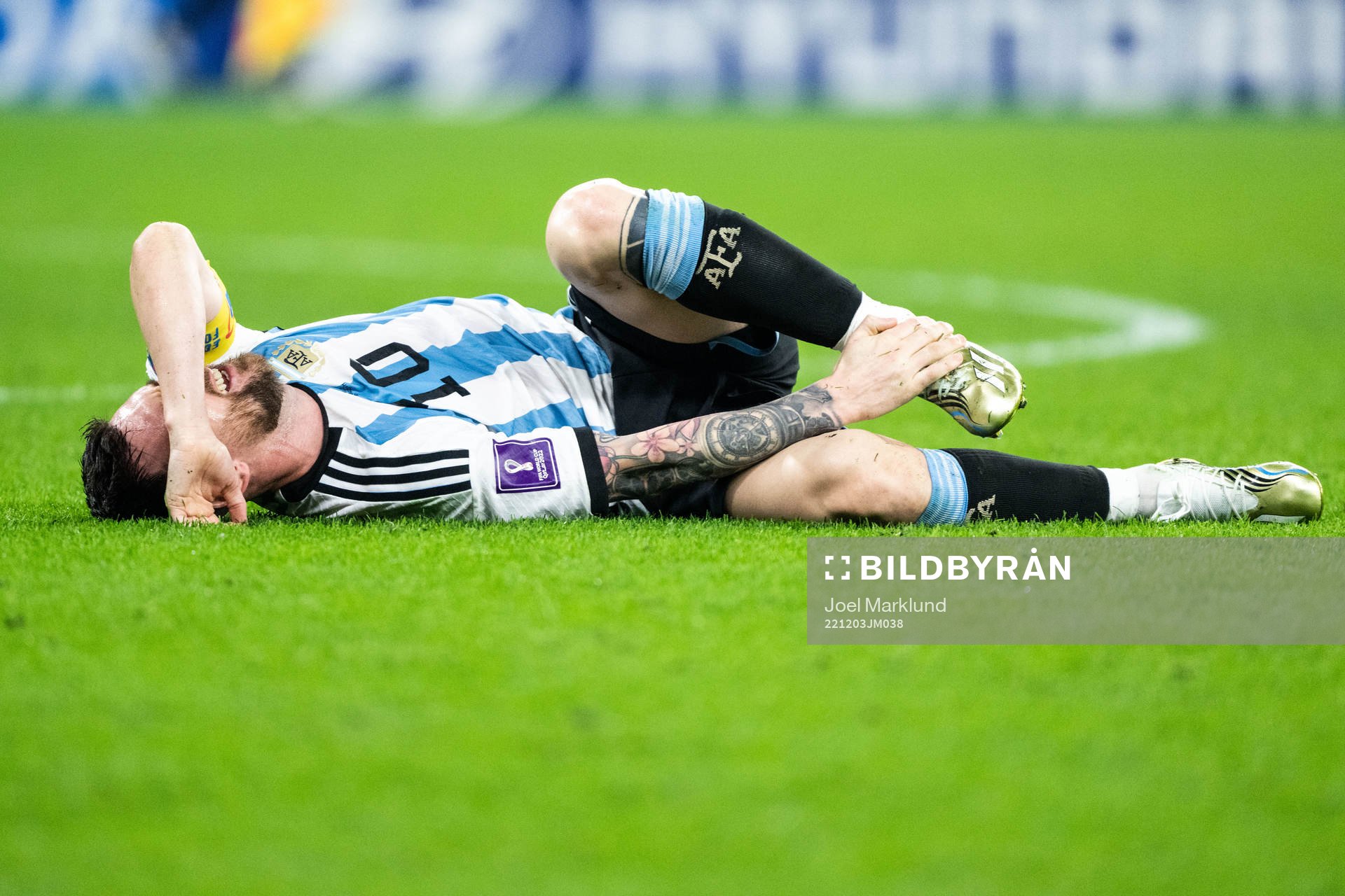 Lionel Messi of Argentina in pain