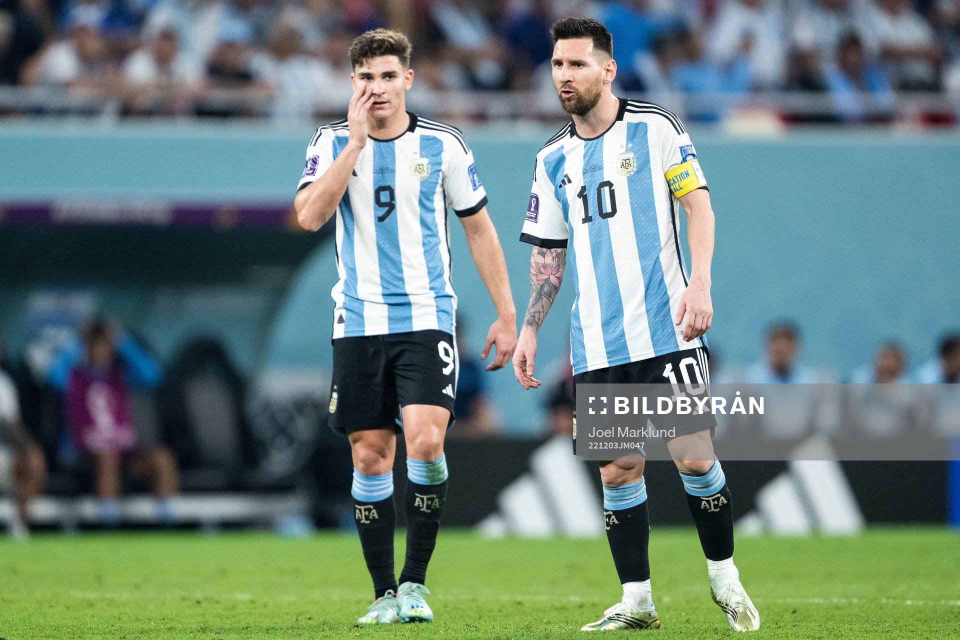 Julian Alvarez and Lionel Messi of Argentina