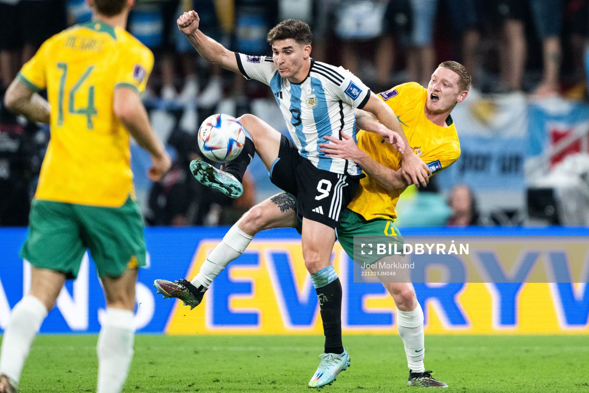 Julian Alvarez of Argentina and Kye Rowles of Australia