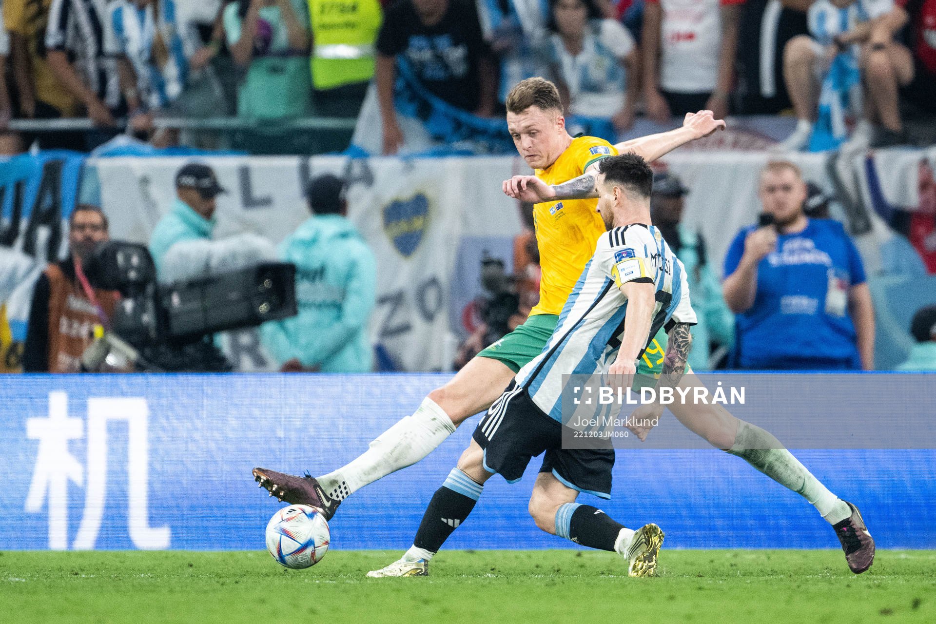 Harry Souttar of Australia and Lionel Messi of Argentina
