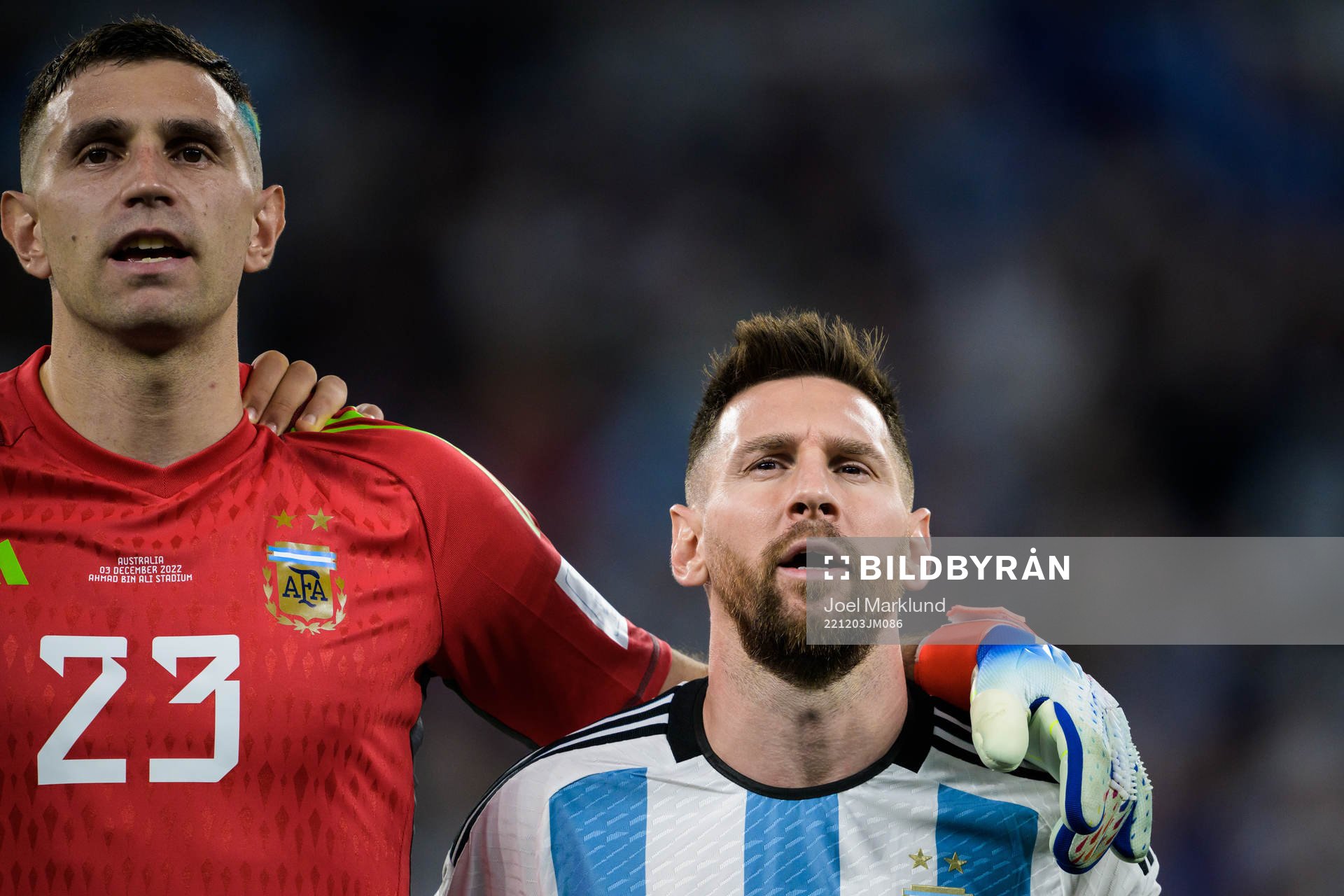 Goalkeeper Emiliano Martinez and Lionel Messi of Argentina