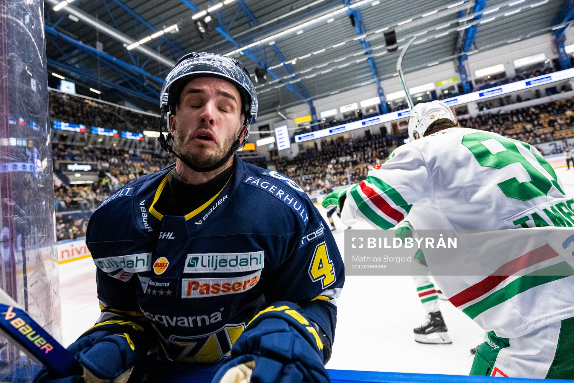 HV71s Niklas Hjalmarsson och Rögles Adam Tambellini