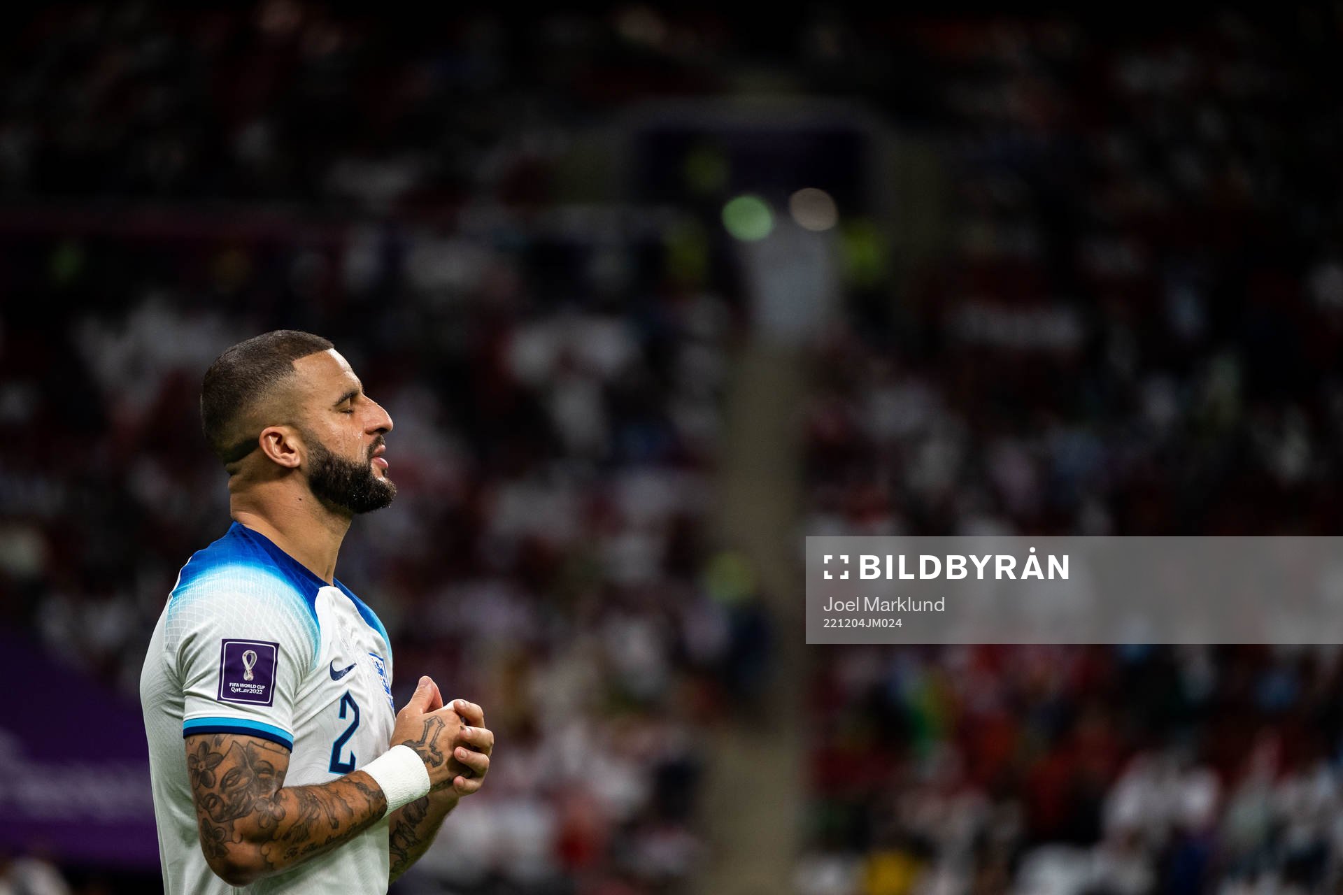 Kyle Walker of England pray ahead of the FIFA World Cup 2022 round of 16 football match between England and Senegal on December 4, 2022 in Doha.