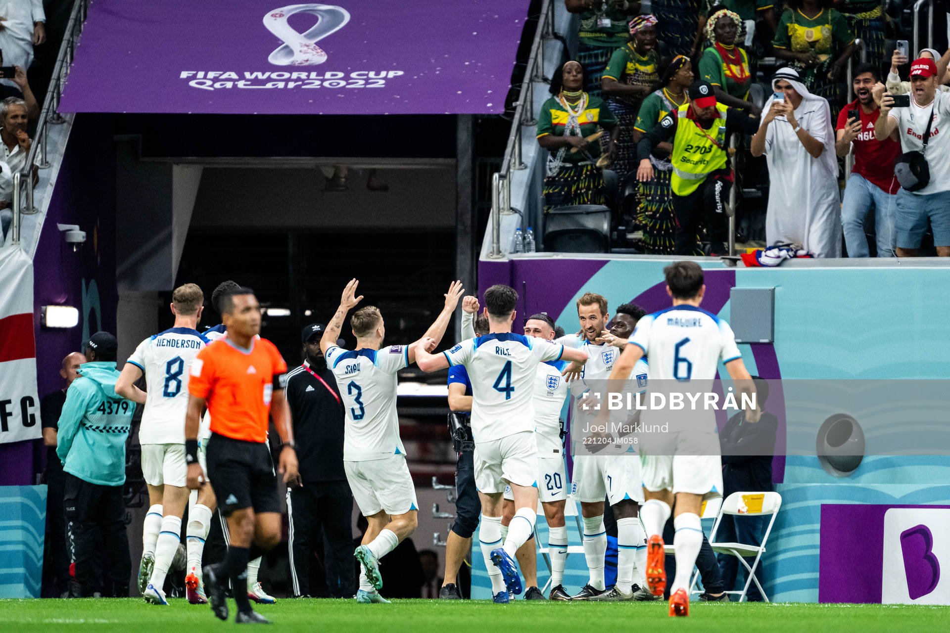 Harry Kane of England celebrates scoring 2-0 with teammates