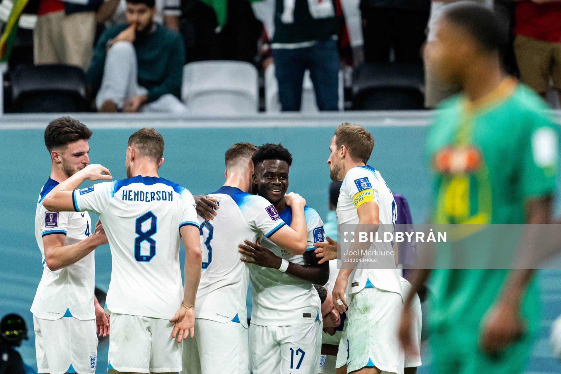 Bukayo Saka of England celebrates scoring 3-0 with teammates