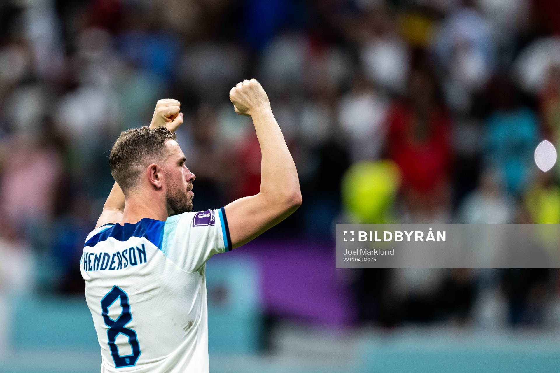 Jordan Henderson of England celebrates