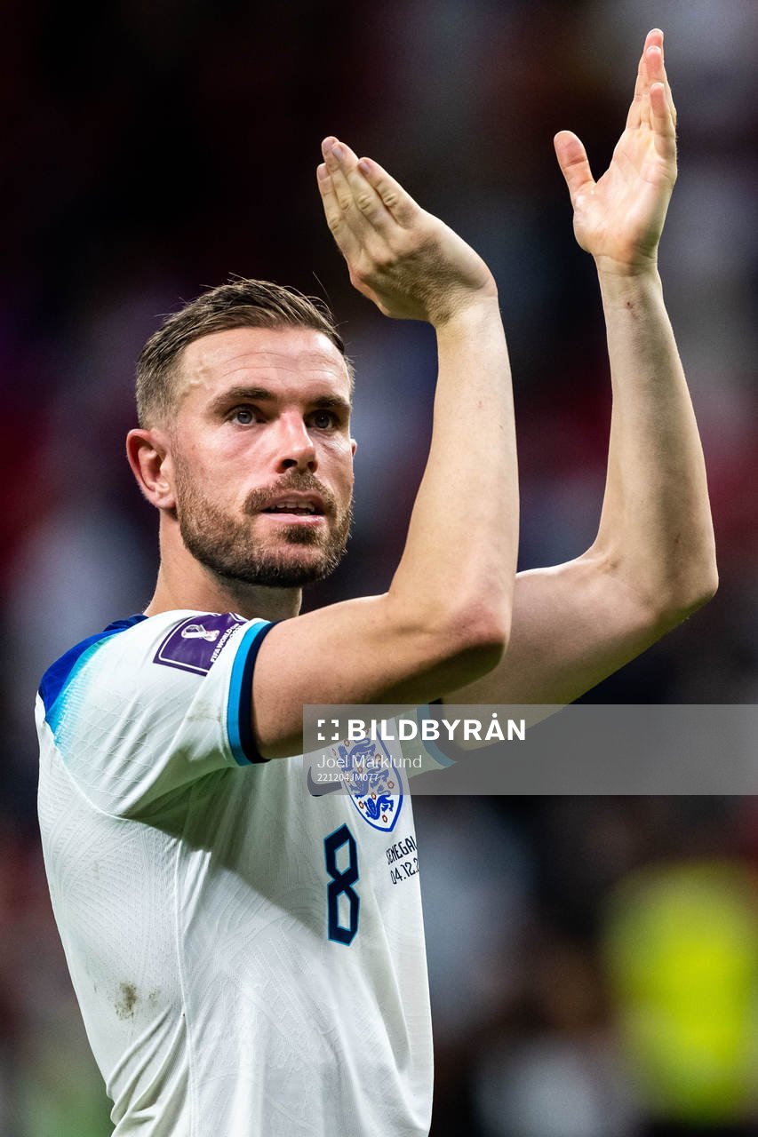 Jordan Henderson of England celebrates