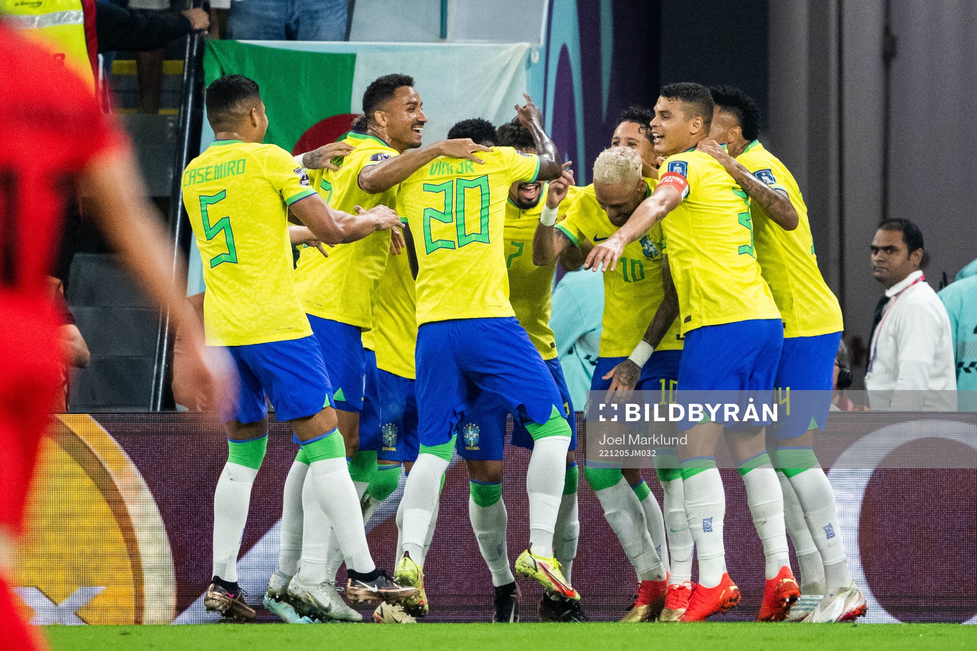 Neymar of Brazil celebrates with teammates
