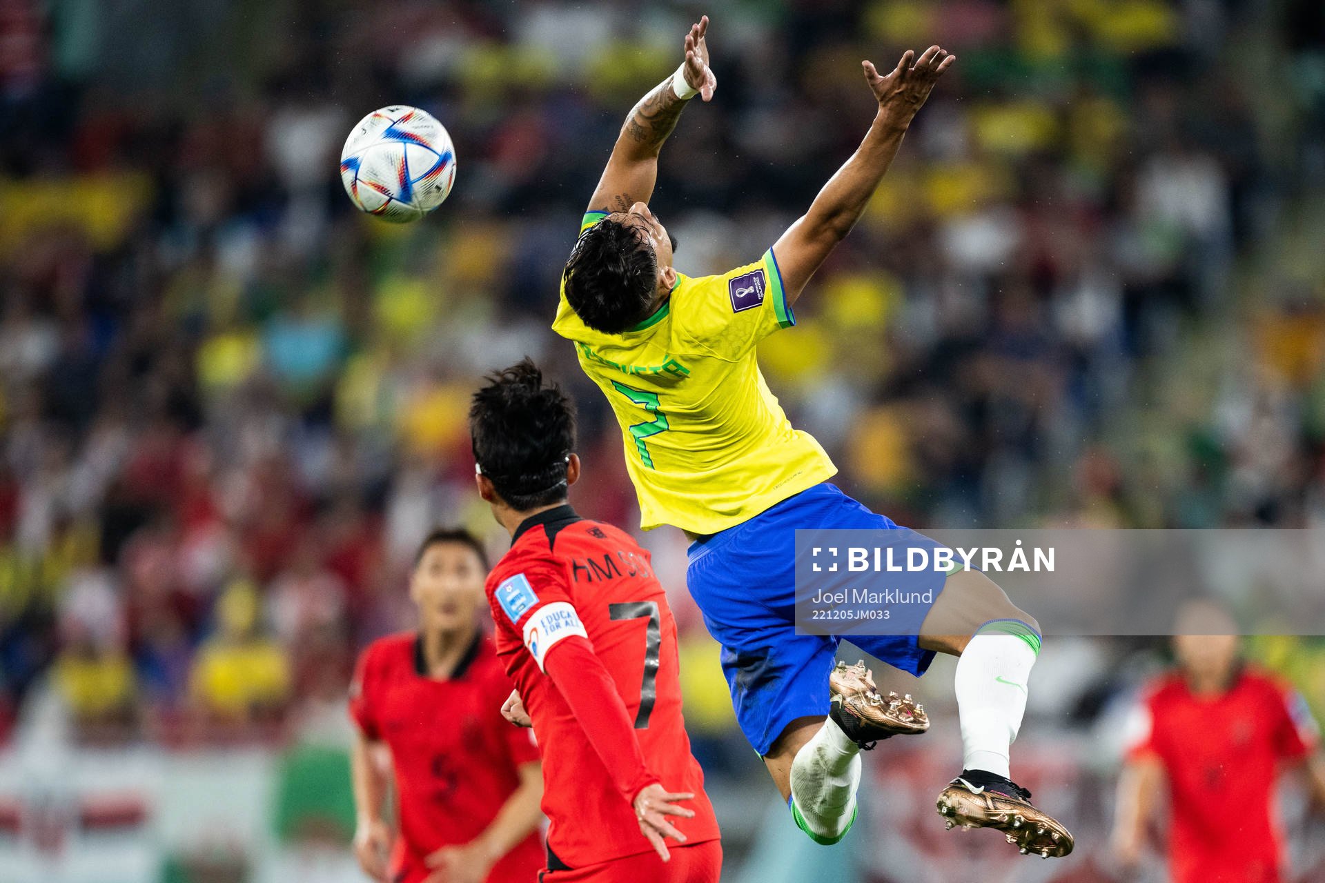 Heungmin Son of South Korea and Lucas Paqueta of Brazil