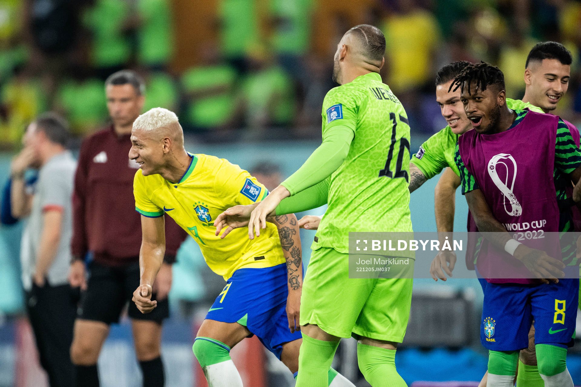 Richarlison of Brazil celebrates with goalkeeper Weverton,