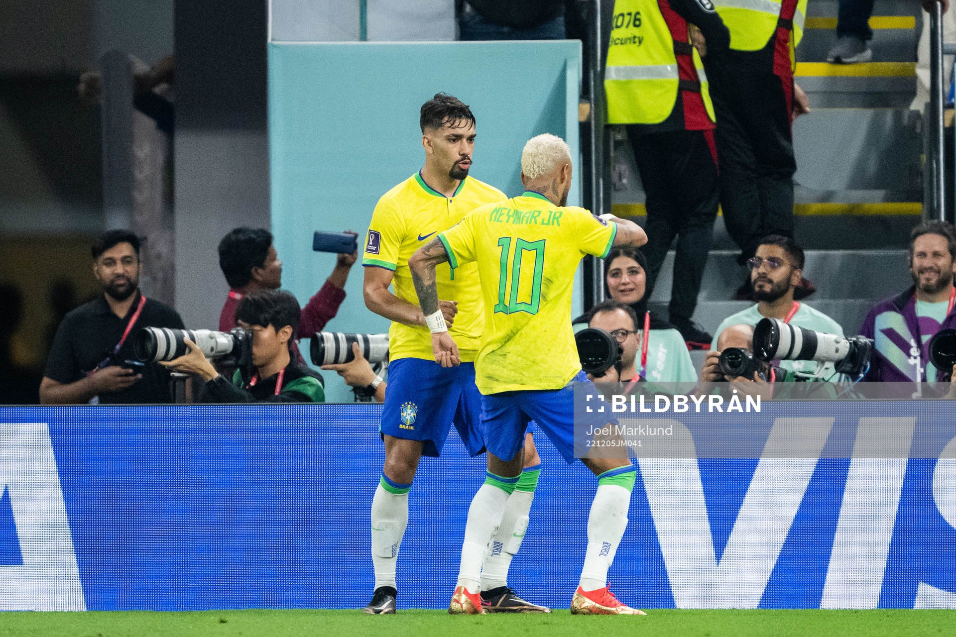 Lucas Paqueta and Neymar of Brazil dances after 4-0 during the FIFA World Cup 2022 round of 16 football match between Brazil and South Korea on December 5, 2022 in Doha.