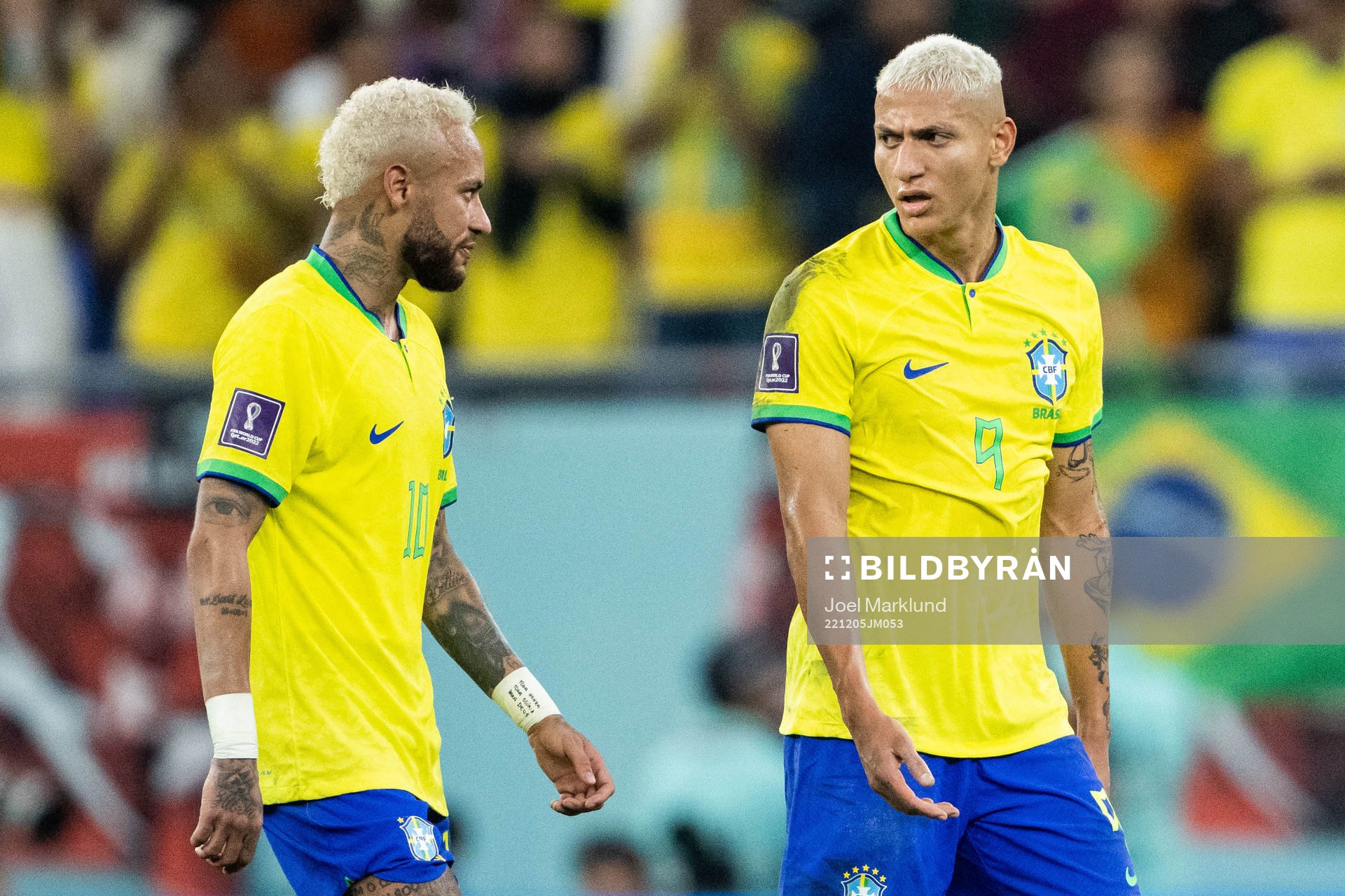 Neymar and Richarlison of Brazil at halftime