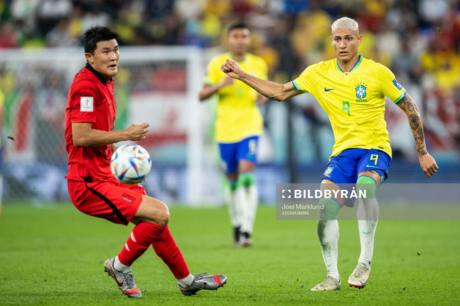 Minjae Kim of South Korea and Richarlison of Brazil