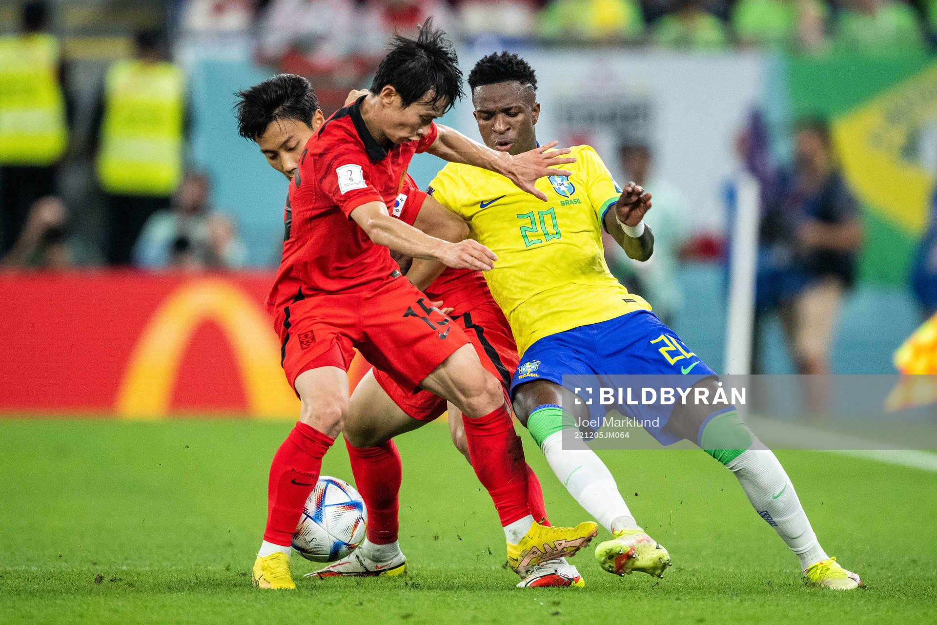 Vinicius Junior of Brazil against Seungho Paik and Moonhwan