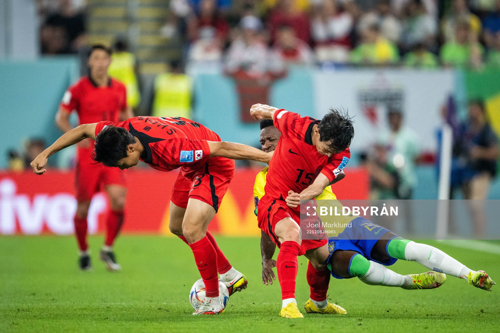 Vinicius Junior of Brazil against Seungho Paik and Moonhwan