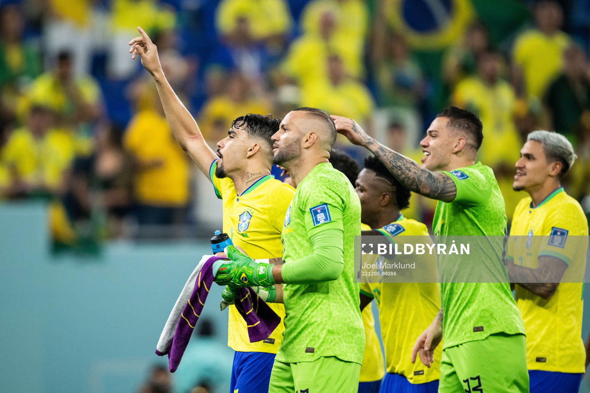Lucas Paqueta of Brazil celebrates with teammates