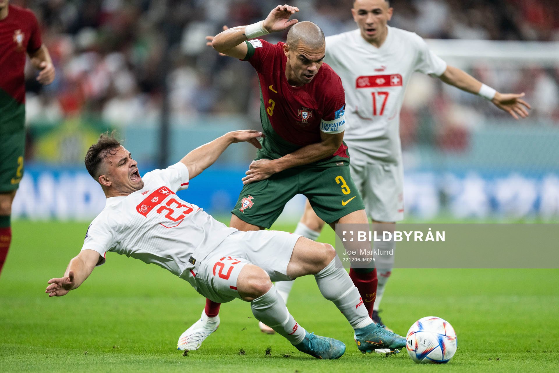 Xherdan Shaqiri of Switzerland and Pepe of Portugal