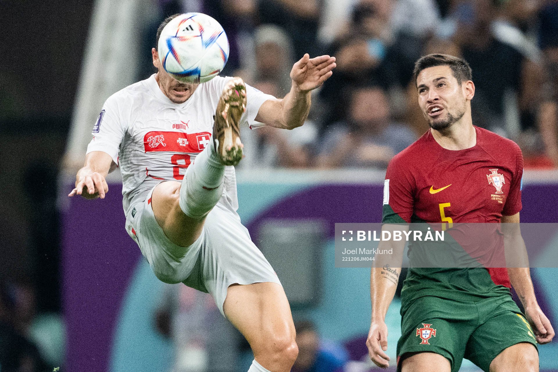 Remo Freuler of Switzerland and Raphael Guerreiro of