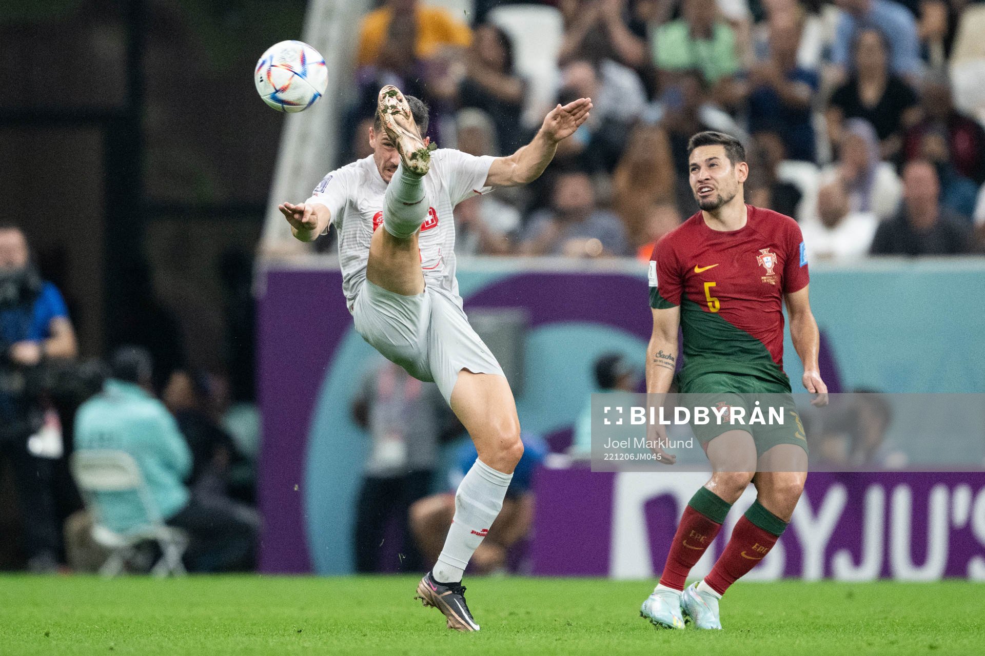 Remo Freuler of Switzerland and Raphael Guerreiro of