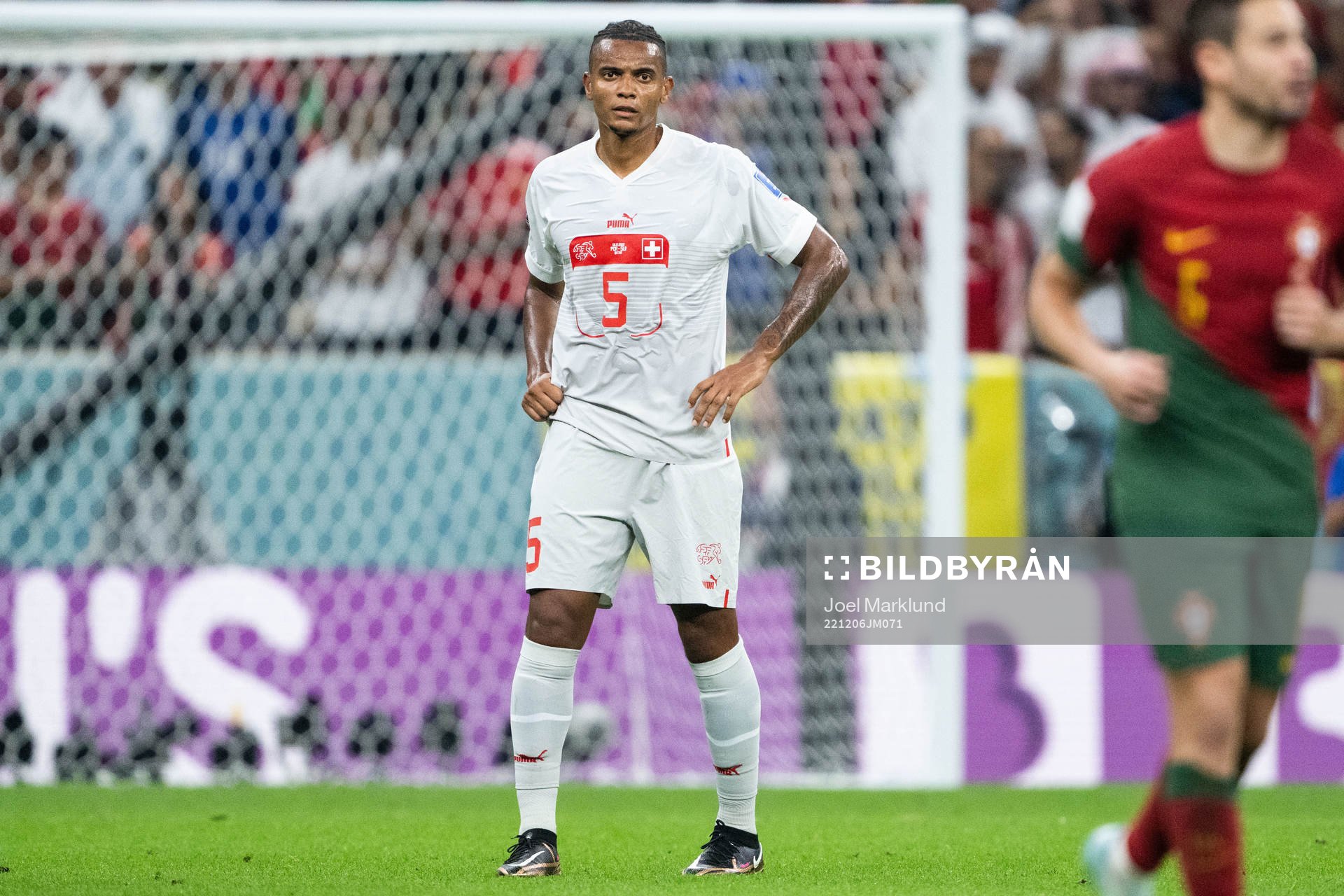 Manuel Akanji of Switzerland looks dejected