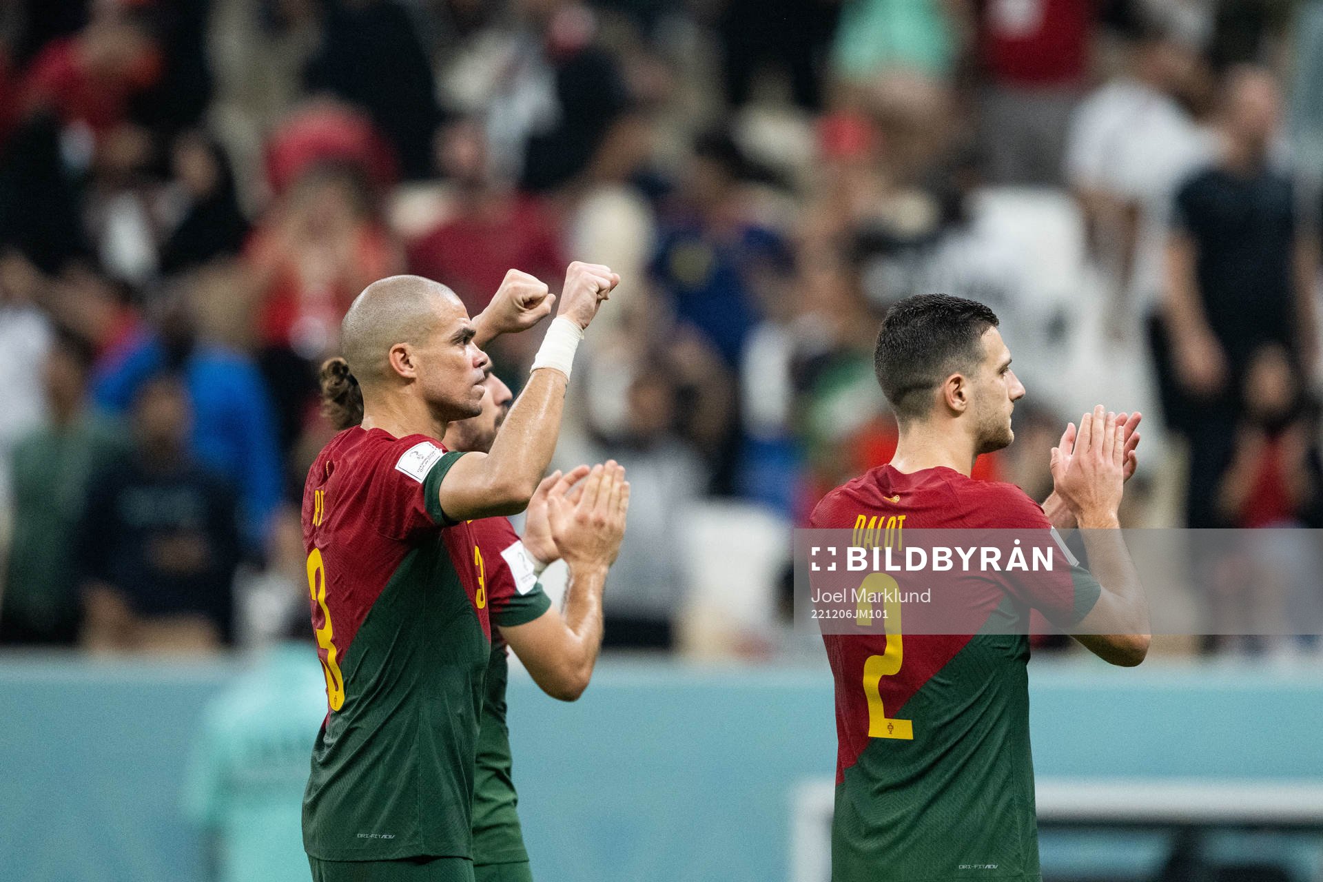 Pepe and Diogo Dalot of Portugal celebrate