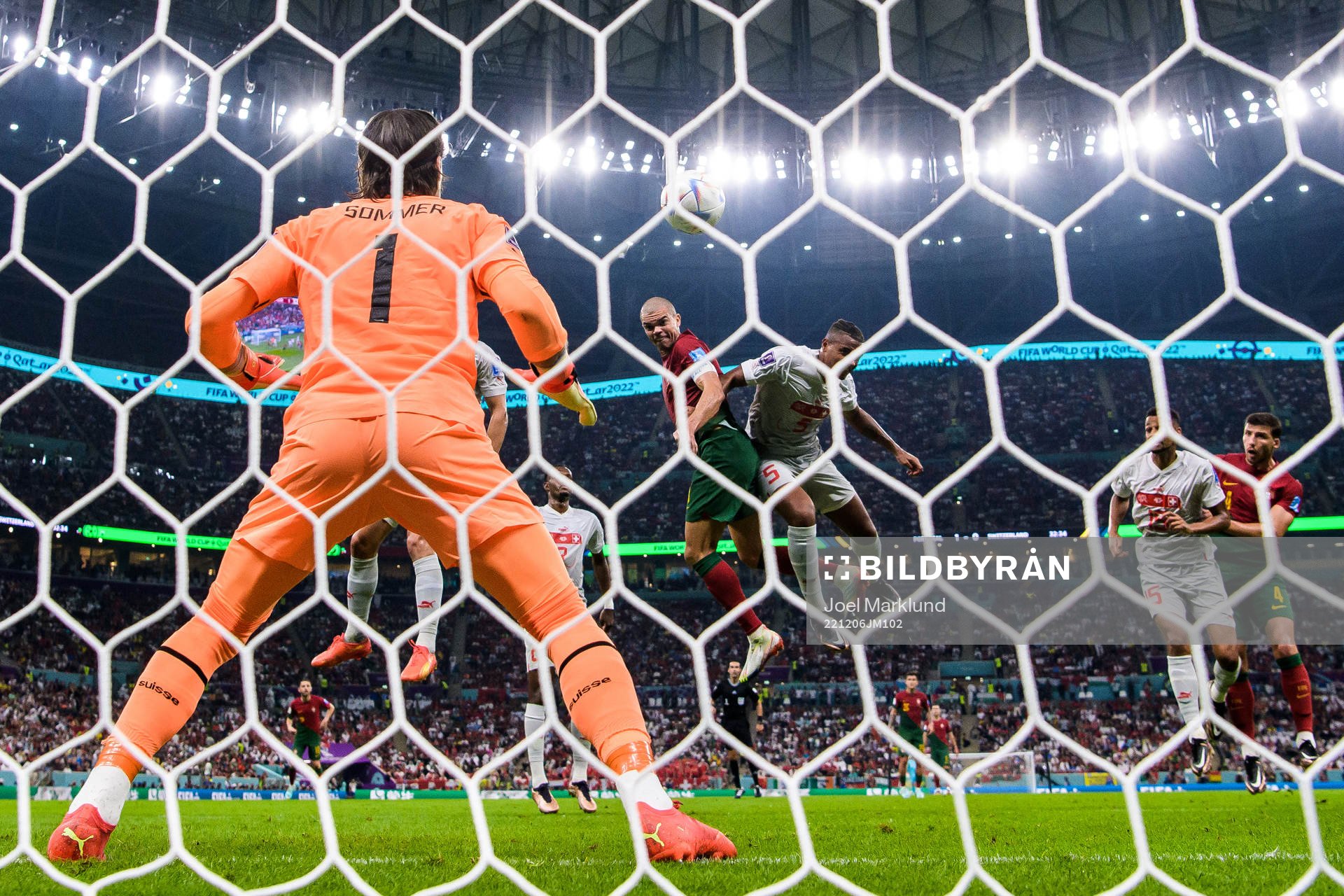 Pepe of Portugal scores the 2-0 goal behind goalkeeper Yann