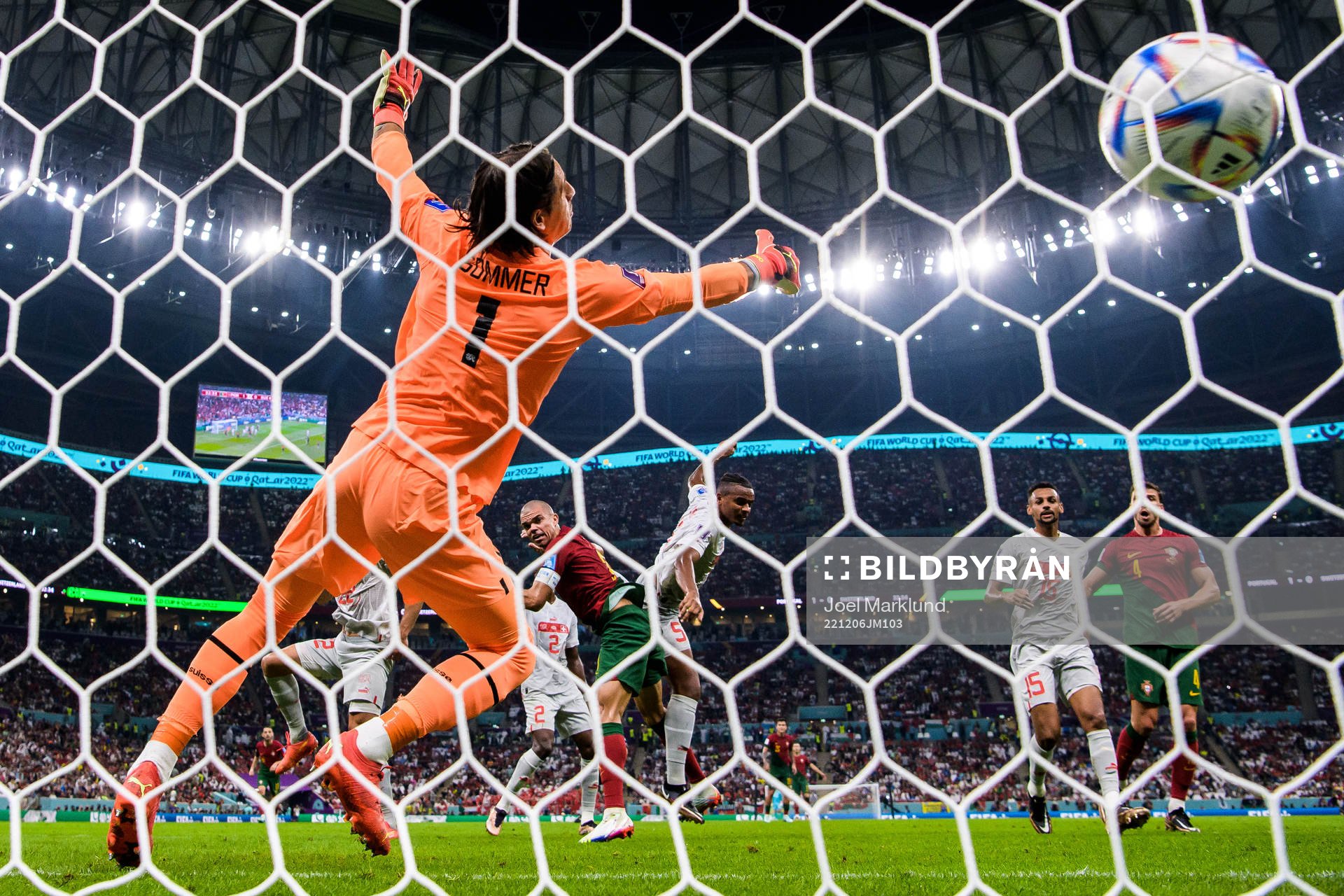 Pepe of Portugal scores the 2-0 goal behind goalkeeper Yann