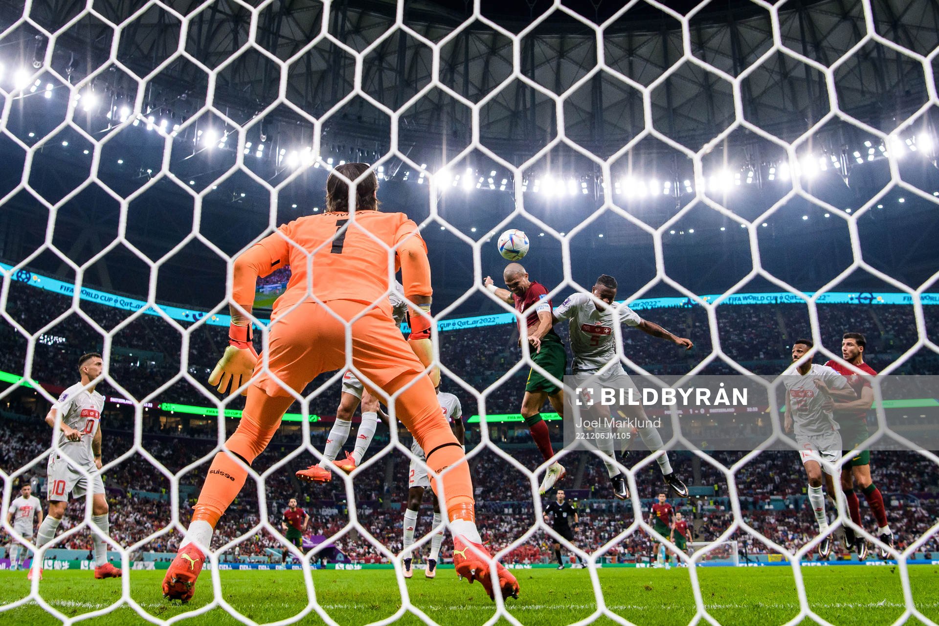 Pepe of Portugal scores the 2-0 goal behind goalkeeper Yann