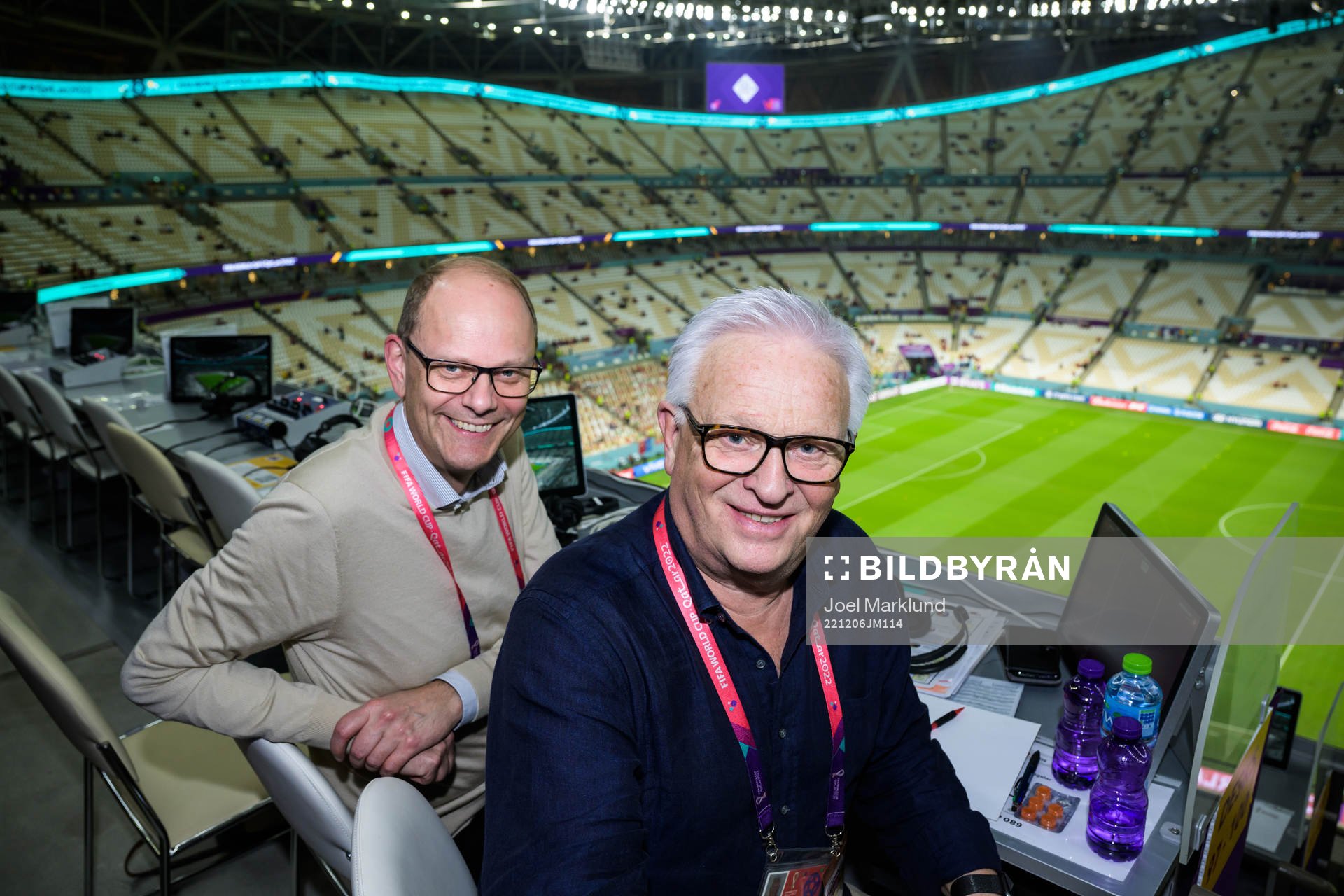 Swedish TV4 broadcast commentators Lars Granqvist and Hans Backe pose for a photo ahead of the FIFA World Cup 2022 round of 16 football match between Portugal and Switzerland on December 6, 2022 in Doha.