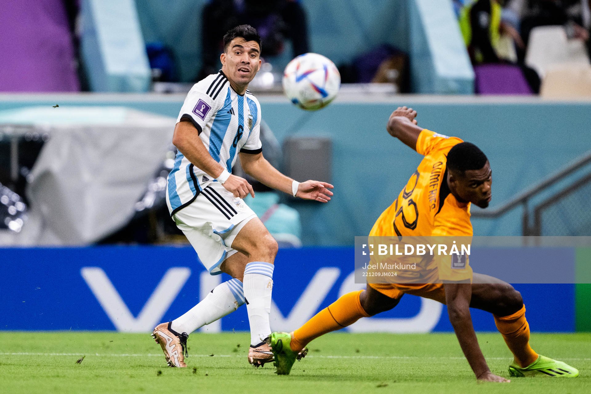 Marcos Acuna of Argentina and Denzel Dumfries of Netherlands