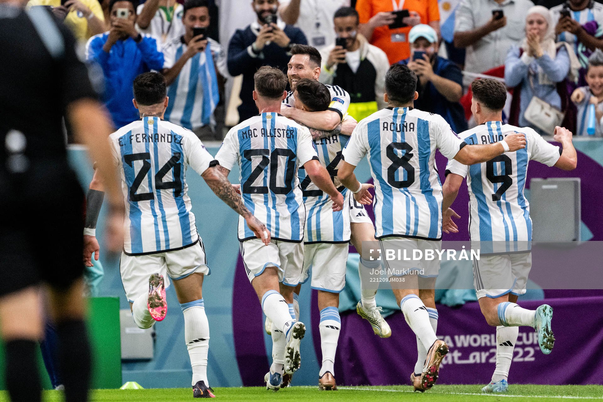 Lionel Messi and Nahuel Molina of Argentina celebrate the