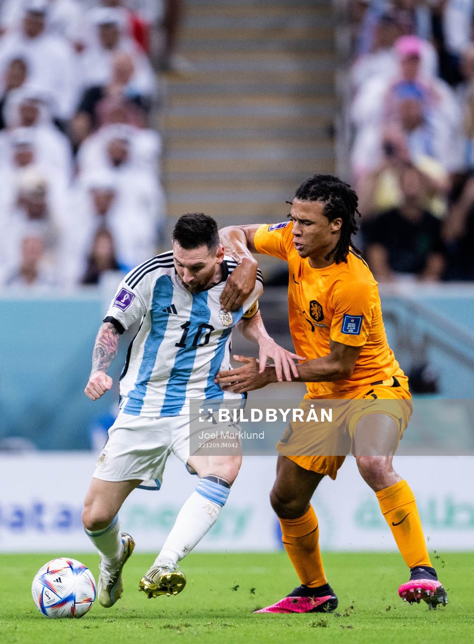 Lionel Messi of Argentina and Nathan Ake of Netherlands during the FIFA World Cup 2022 quarterfinal between Netherlands and Argentina on December 9, 2022 in Doha. 