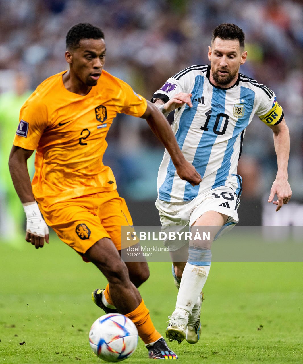 Jurrien Timber of Netherlands and Lionel Messi of Argentina
