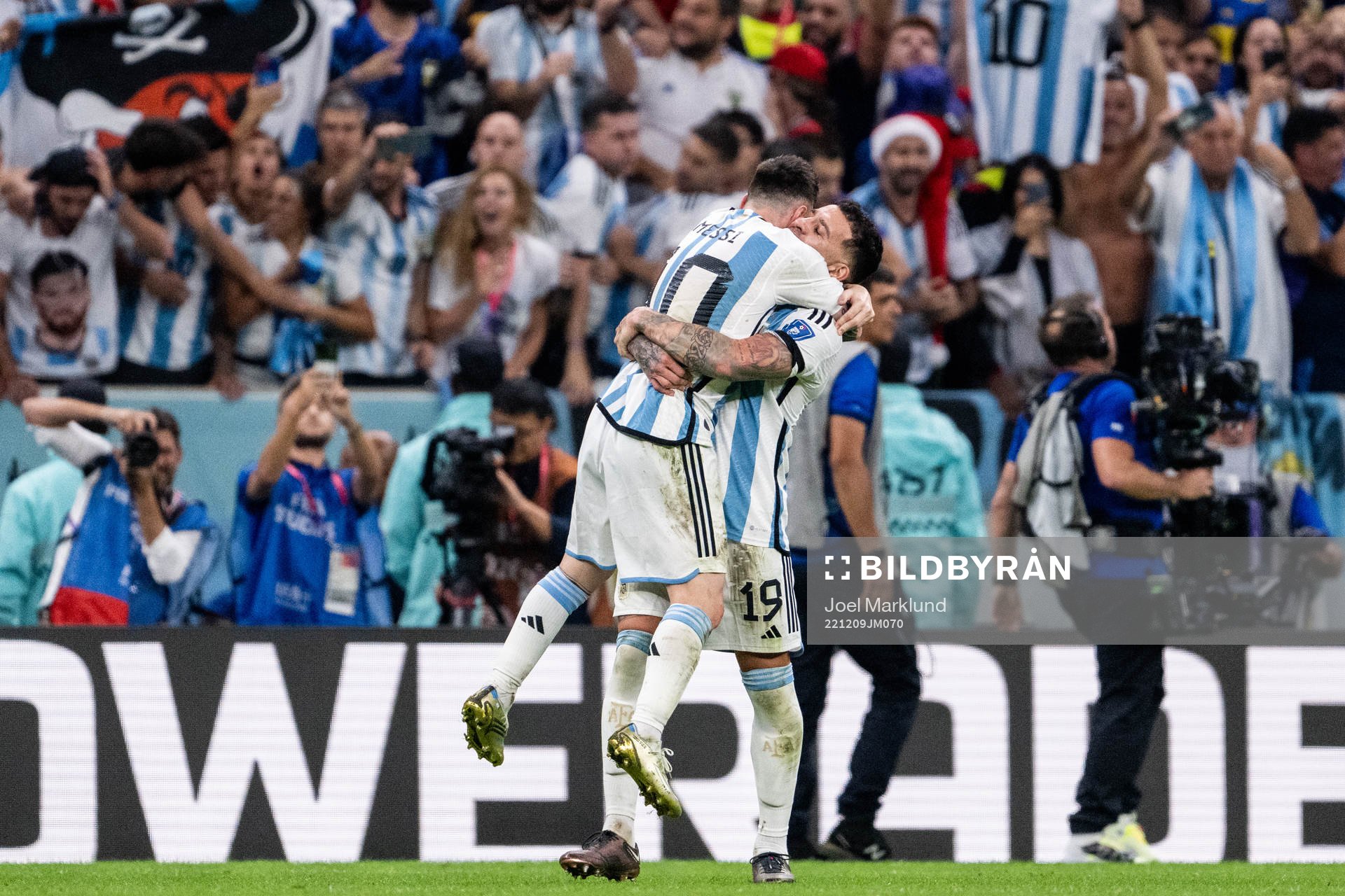 Lionel Messi of Argentina celebrate with Nicolas Otamendi