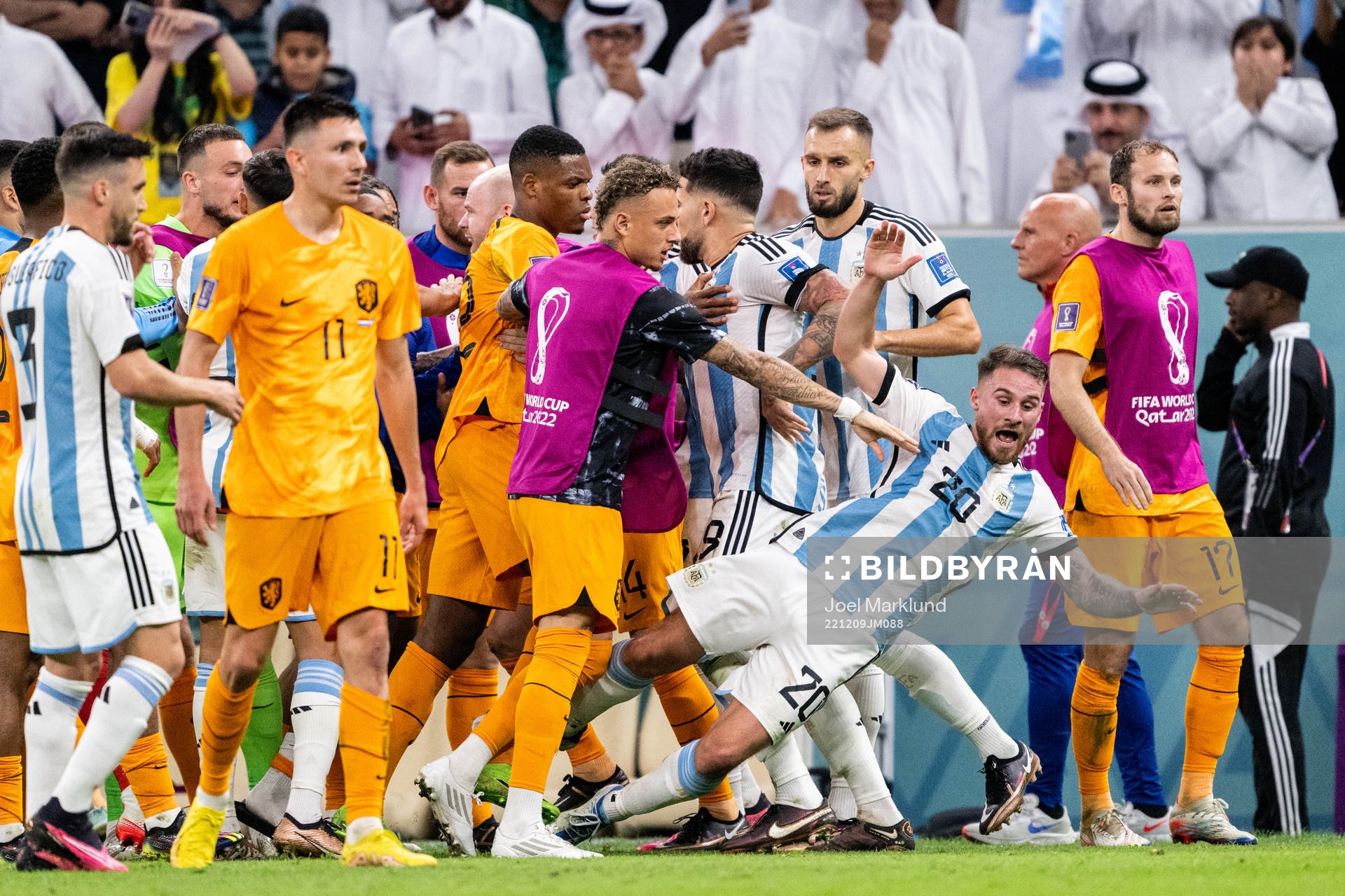 Alexis Mac Allister of Argentina falls as players of