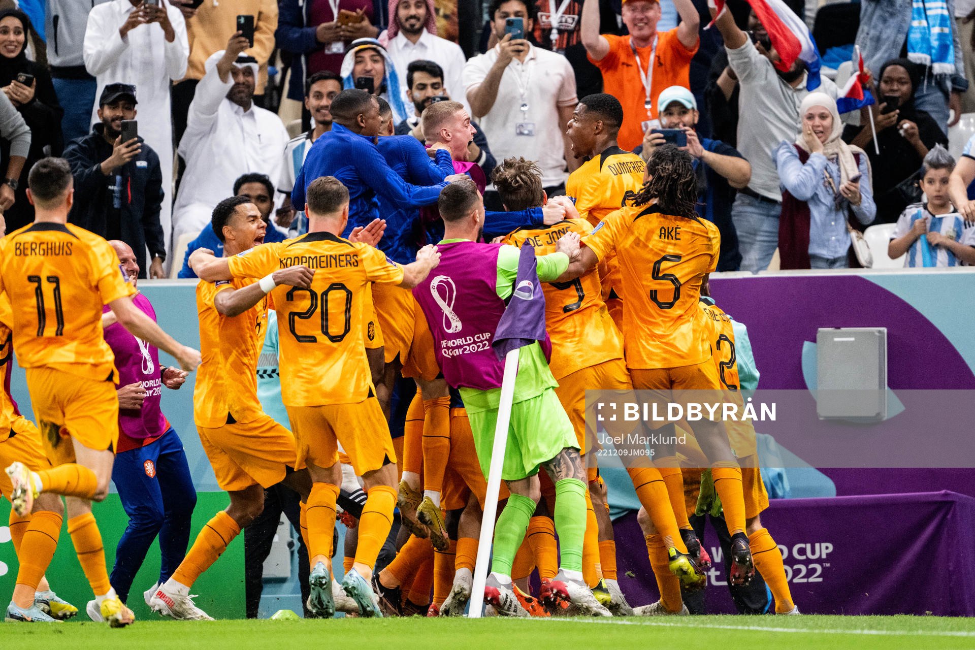 Wout Weghorst of Netherlands celebrate with team mates after scoring the 2-2 goal during the FIFA World Cup 2022 quarterfinal between Netherlands and Argentina on December 9, 2022 in Doha.