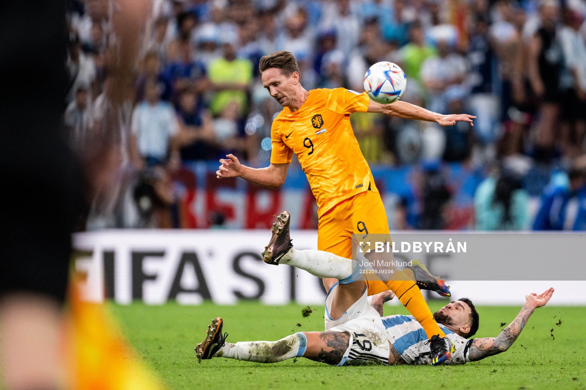 Luuk de Jong of Netherlands and Nicolas Otamendi of
