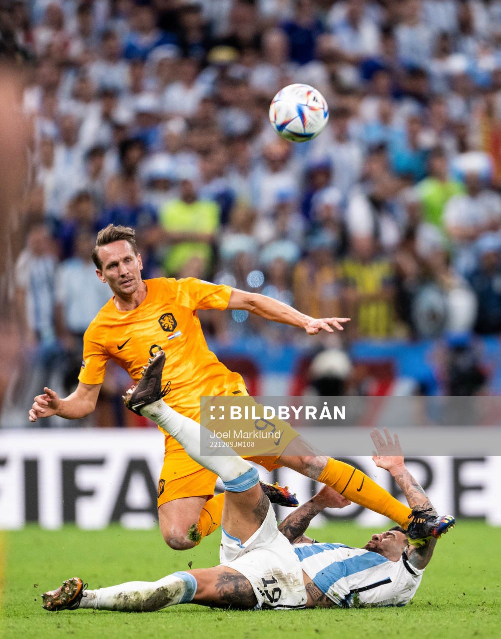 Luuk de Jong of Netherlands and Nicolas Otamendi of
